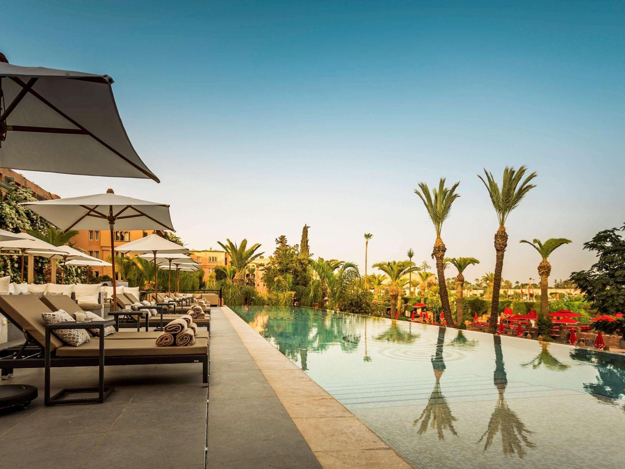 فندق سوفيتيل مراكش لونج آند سبا المظهر الخارجي الصورة The pool at the Four Seasons Hotel Marrakech